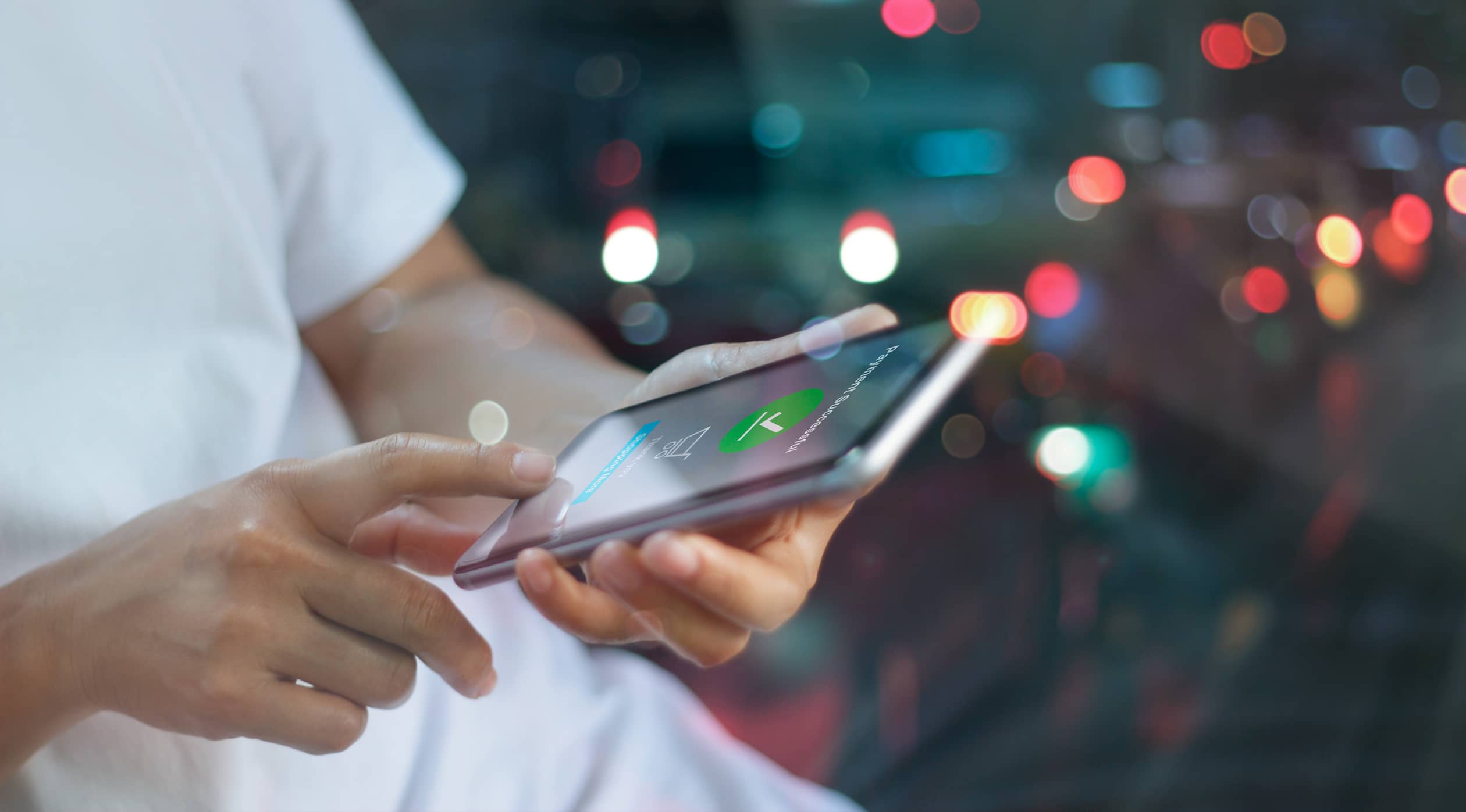 online shopping and payment, online banking, man using smartphone and payment successful on screen colorful night background.