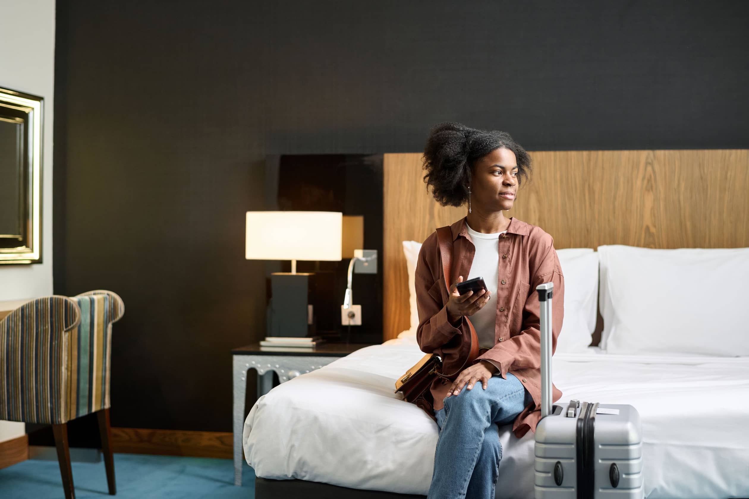 black girl in hotel room